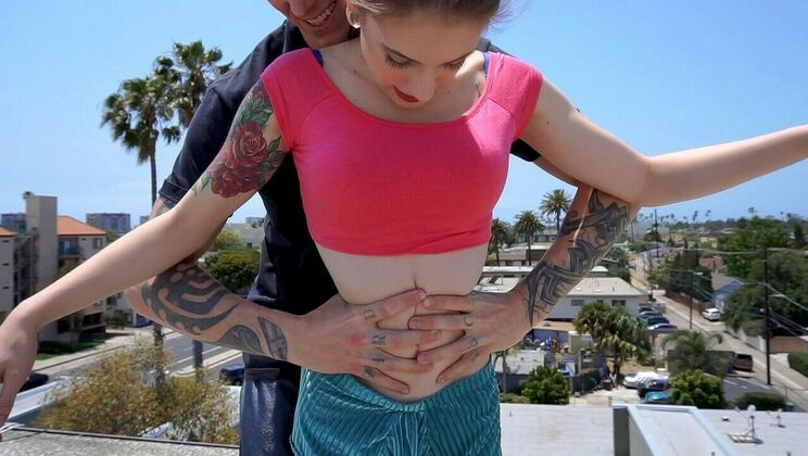 Outdoor Fun: Redhead Babe Bends Legs Behind Head